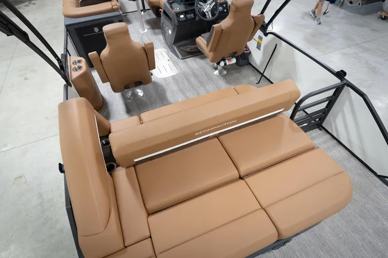 Slide: The Image of 2026 Bennington 22 MSB boat interior with tan seating and modern design. - 15