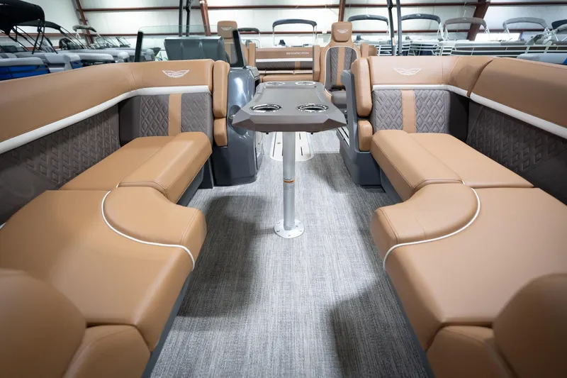 Slide: The Image of Luxurious interior of 2026 Bennington 22 MSB pontoon boat with plush seating and modern design. - 16