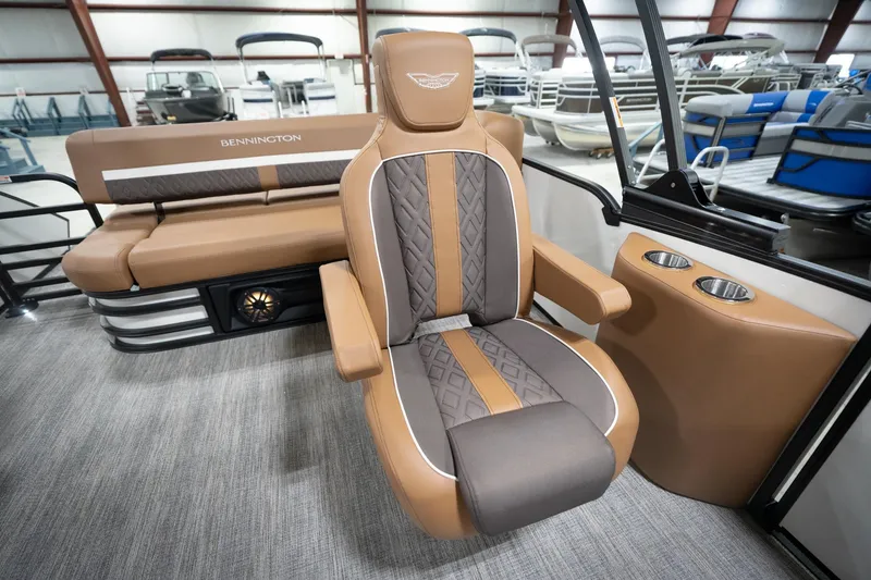 Slide: The Image of 2026 Bennington 22 MSB boat interior with luxurious seating and cup holders. - 27