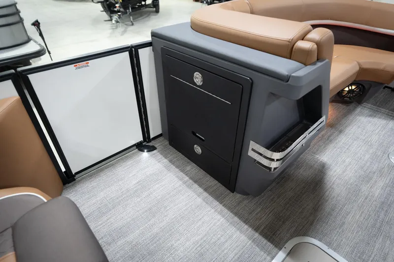 Slide: The Image of 2026 Bennington 22 MSB boat interior with sleek seating and modern storage design. - 28