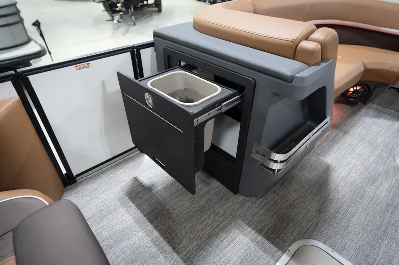 Slide: The Image of 2026 Bennington 22 MSB boat interior with pull-out storage compartment and seating. - 29