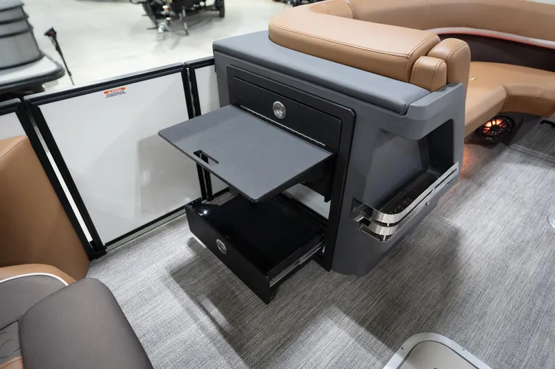 Slide: The Image of 2026 Bennington 22 MSB boat interior with fold-out table and seating. - 30