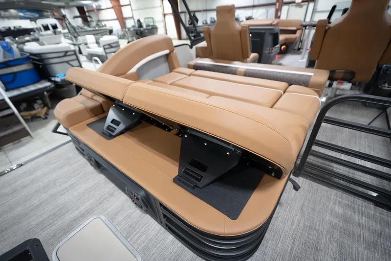 Slide: The Image of 2026 Bennington 22 MSB boat interior with tan seating and modern design. - 35