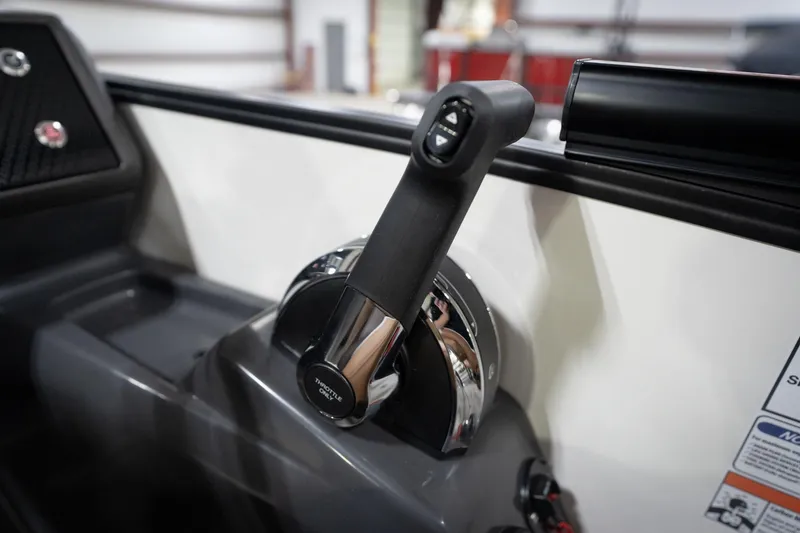 Slide: The Image of Throttle control lever on 2026 Bennington 22 MSB boat dashboard. - 44