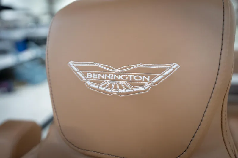 Slide: The Image of 2026 Bennington 22 MSB boat seat with embroidered logo on tan leather. - 46