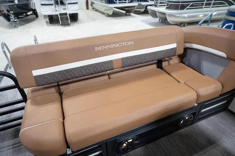 Slide: The Image of 2026 Bennington 22 MSB boat interior with tan seating and stylish design. - 47
