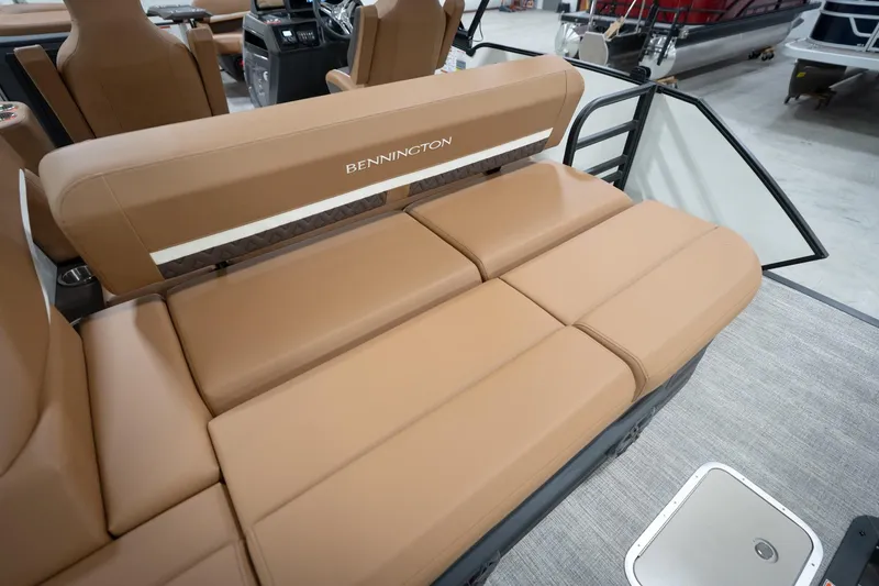 Slide: The Image of 2026 Bennington 22 MSB boat interior with tan seating and modern design. - 48