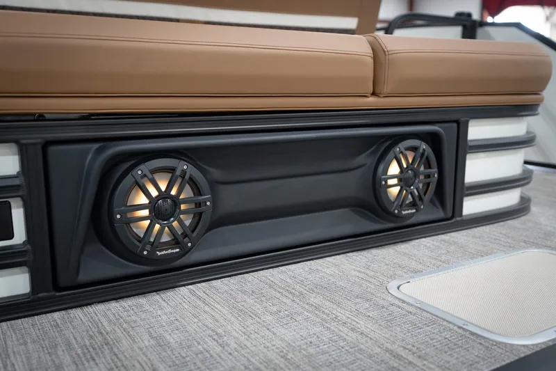 Slide: The Image of 2026 Bennington 22 MSB boat interior with premium speakers and cushioned seating. - 51