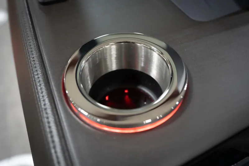 Slide: The Image of Illuminated cup holder on 2026 Bennington 22 MSB boat, featuring sleek design and red lighting. - 52
