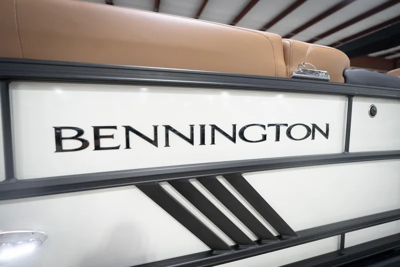 Slide: The Image of 2026 Bennington 22 MSB boat with sleek design and logo detail. - 55