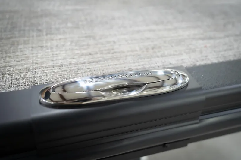 Slide: The Image of Close-up of 2026 Bennington 22 MSB boat emblem on textured surface. - 59