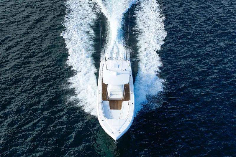 Slide: The Image of Aerial view of 2017 Intrepid 375 Nomad FE boat cruising on open water. - 27