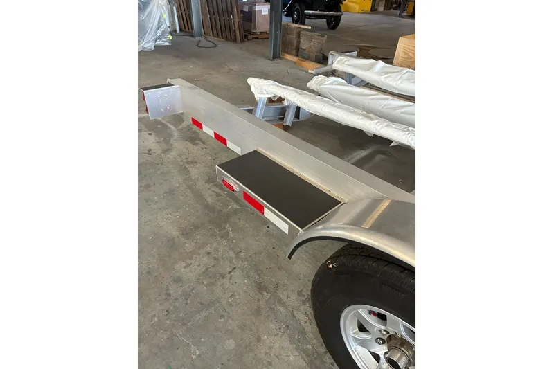 Slide: The Image of Trailer for 2017 Intrepid 375 Nomad FE in a warehouse setting. - 68
