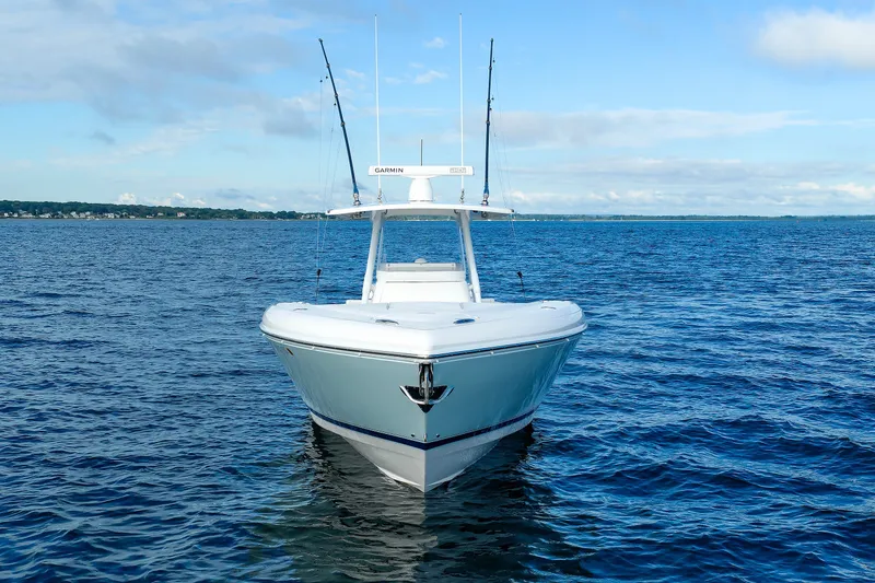 Slide: The Image of 2017 Intrepid 375 Nomad FE boat on calm blue ocean waters. - 4