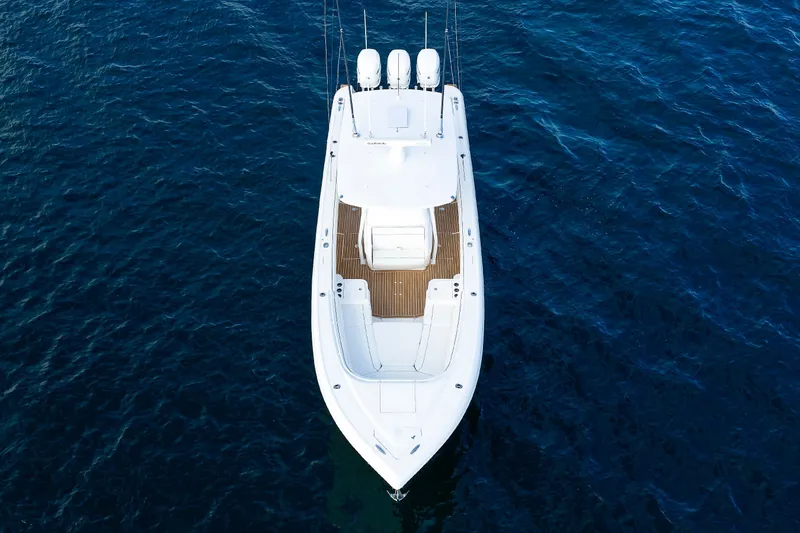 Slide: The Image of Aerial view of 2017 Intrepid 375 Nomad FE boat on deep blue water. - 10