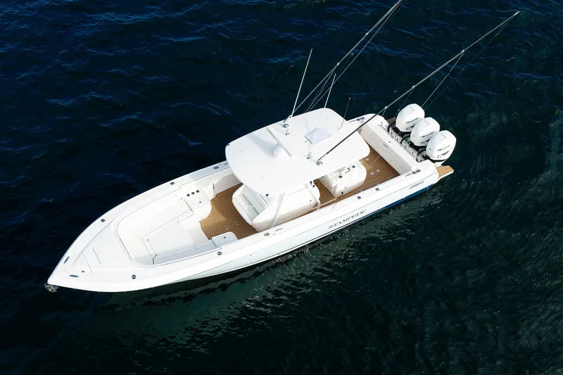Slide: The Image of Aerial view of 2017 Intrepid 375 Nomad FE boat on open water. - 12