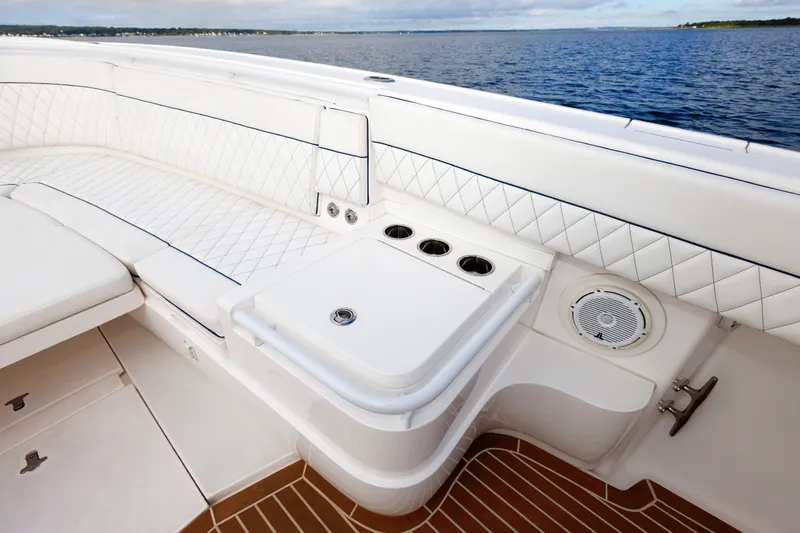 Slide: The Image of Luxurious seating area on a 2017 Intrepid 375 Nomad FE boat, overlooking the ocean. - 56