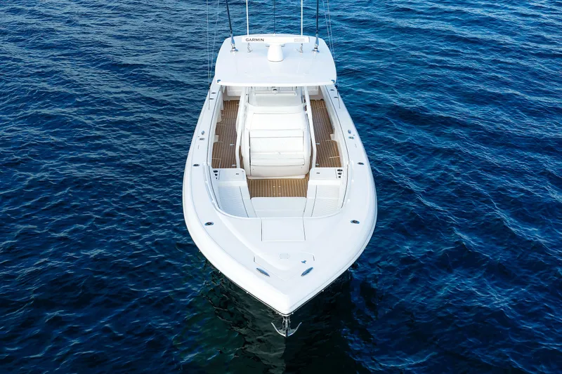 Slide: The Image of 2017 Intrepid 375 Nomad FE boat on open water, aerial view. - 9