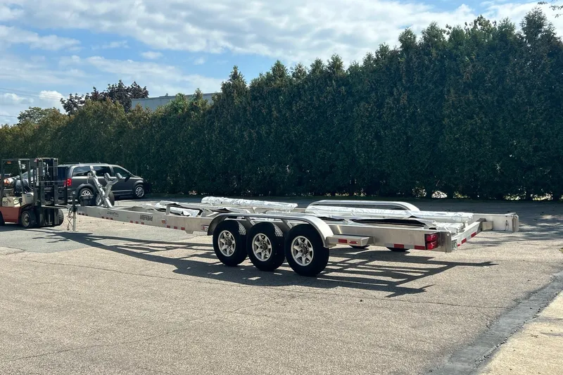 Slide: The Image of Trailer for 2017 Intrepid 375 Nomad FE on pavement, surrounded by trees. - 62