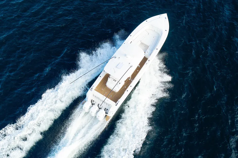 Slide: The Image of Aerial view of 2017 Intrepid 375 Nomad FE boat cruising on open water. - 28