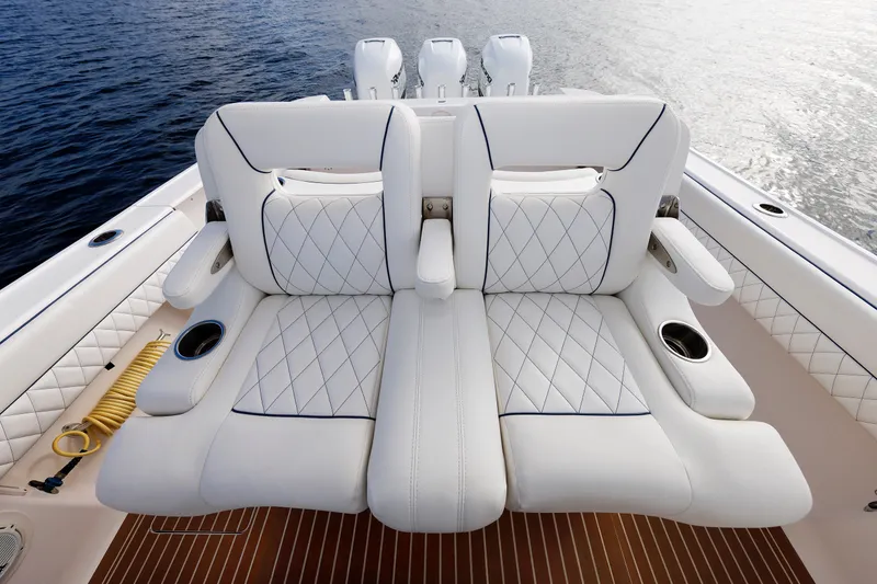 Slide: The Image of Luxurious seating on 2017 Intrepid 375 Nomad FE boat with diamond-stitched upholstery. - 44