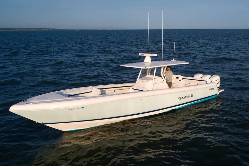 The Image of 2017 Intrepid 375 Nomad FE boat cruising on open water. - 1