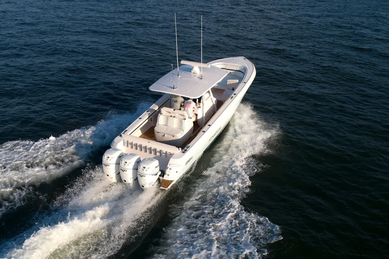 Slide: The Image of 2017 Intrepid 375 Nomad FE boat cruising on open water. - 4