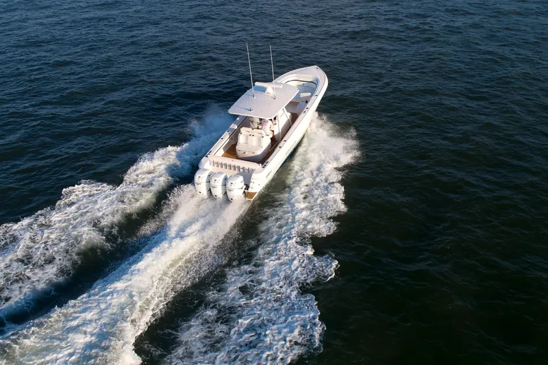 Slide: The Image of 2017 Intrepid 375 Nomad FE cruising on open water, aerial view. - 6