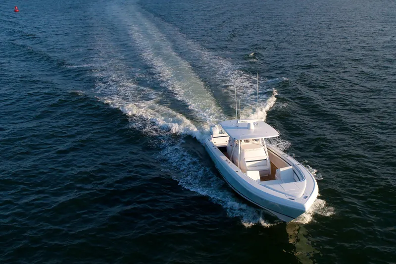 Slide: The Image of Aerial view of 2017 Intrepid 375 Nomad FE cruising on open water. - 9