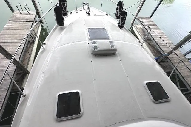 Slide: The Image of 2001 Sea Ray 340 Sundancer boat deck view at dock. - 13