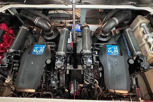 Slide: The Image of Engine compartment of a 2001 Sea Ray 340 Sundancer with twin MerCruiser engines. - 27