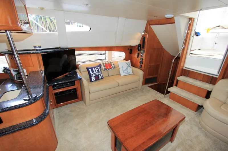 Slide: The Image of Interior of 2001 Carver 506 Motor Yacht with sofa and TV. - 15