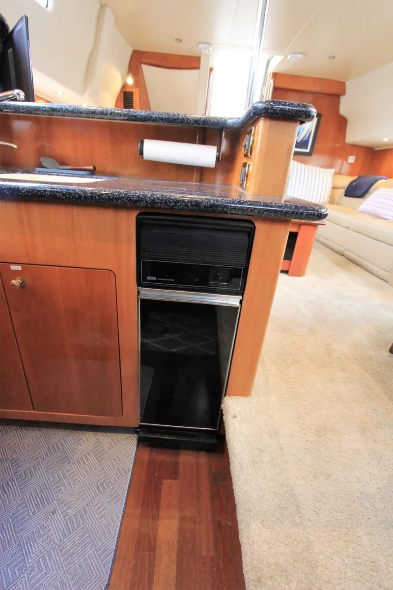 Slide: The Image of Interior of 2001 Carver 506 Motor Yacht with modern kitchen. - 19