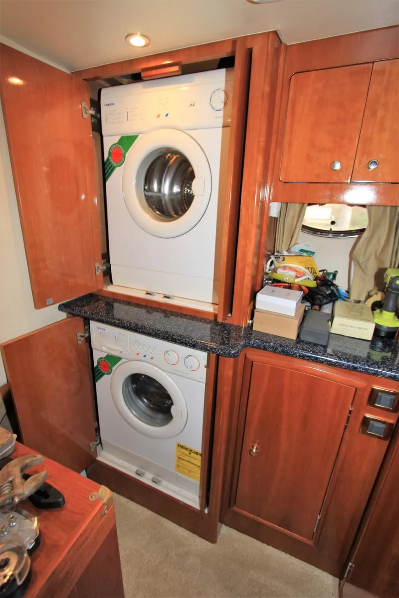 Slide: The Image of Washer and dryer in 2001 Carver 506 Motor Yacht. - 30