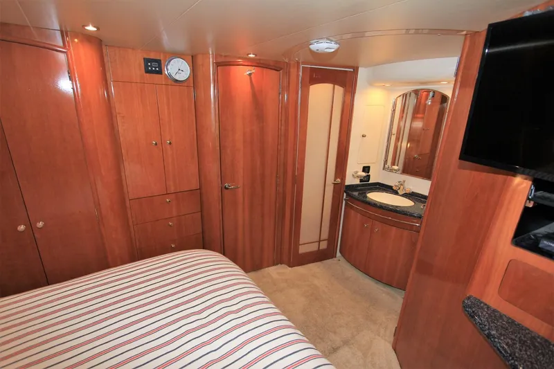 Slide: The Image of Interior of 2001 Carver 506 Motor Yacht with wooden furnishings. - 36