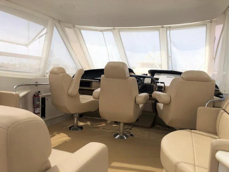Slide: The Image of Interior of 2001 Carver 506 Motor Yacht with beige seating. - 43