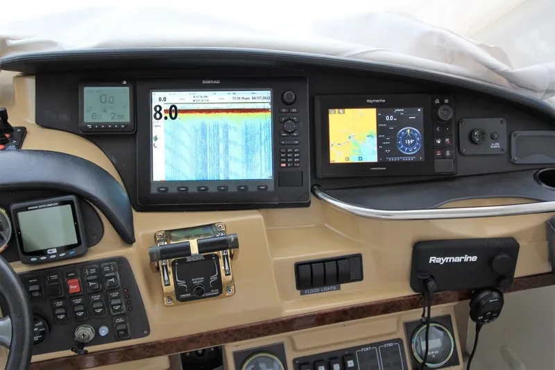 Slide: The Image of Dashboard of 2001 Carver 506 Motor Yacht with navigation systems. - 46