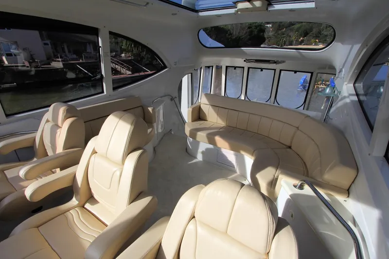 Slide: The Image of Interior of 2001 Carver 506 Motor Yacht with beige leather seating. - 47