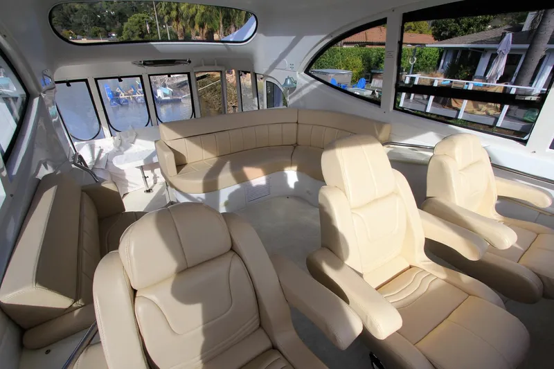 Slide: The Image of Interior of 2001 Carver 506 Motor Yacht with beige leather seating. - 48