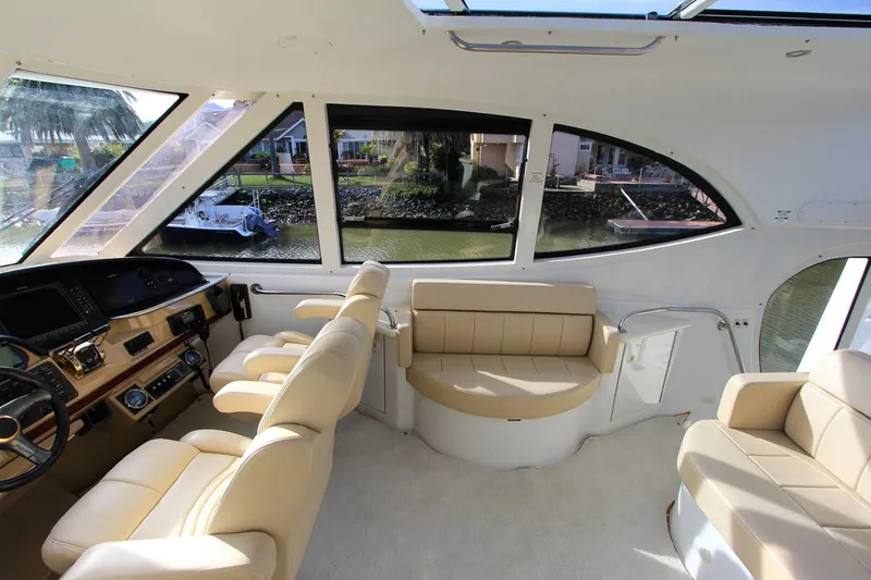 Slide: The Image of Interior of 2001 Carver 506 Motor Yacht with leather seating. - 49
