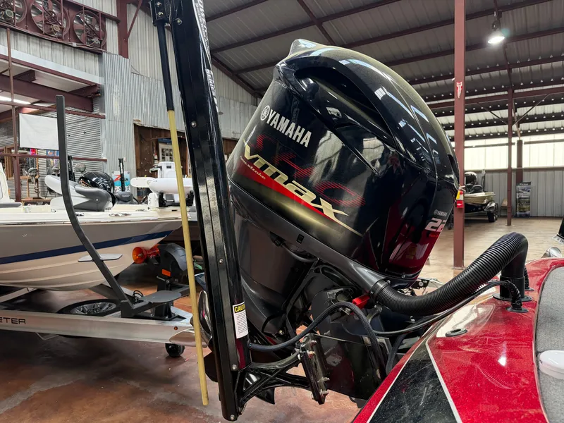 Slide: The Image of 2016 Skeeter ZX225 with Yamaha Vmax engine in warehouse. - 14