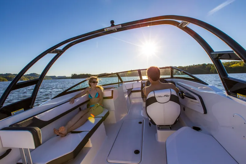 Slide: The Image of Interior of a 2016 Sea Ray 21 SPX boat with helm and seating. - 12
