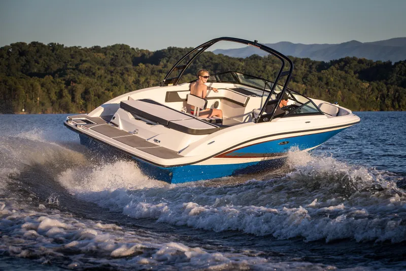 Slide: The Image of Steering wheel and dashboard of a 2016 Sea Ray 21 SPX boat. - 14