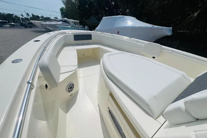 Slide: The Image of 2024 Cobia 350 Center Console boat with spacious seating and sleek design. - 3
