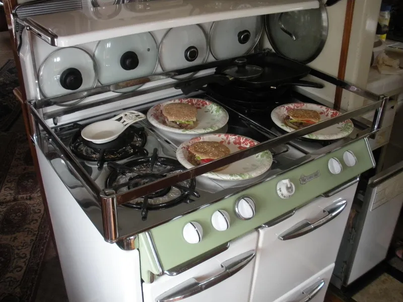 Slide: The Image of Vintage stove with plates and sandwiches, 1929 yacht interior. - 43