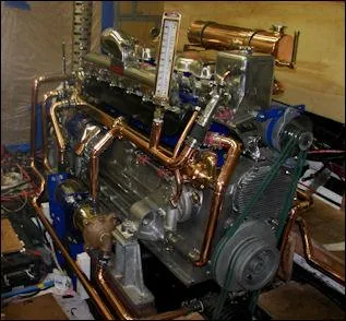 Slide: The Image of 1929 HOFFAR-BEECHING Fantail Yacht engine with copper piping and mechanical components. - 5