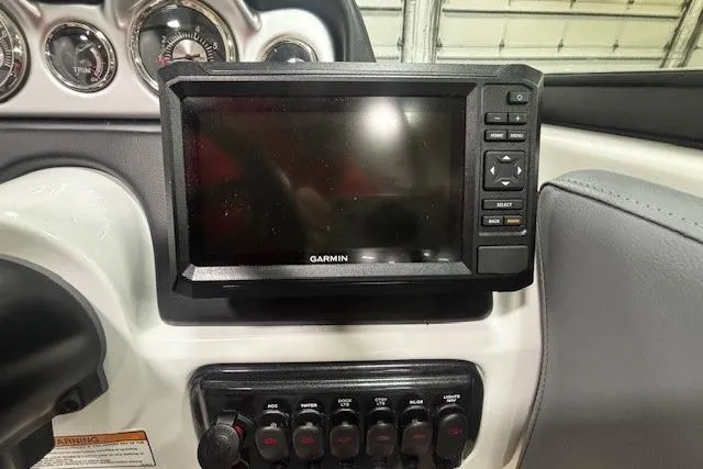 Slide: The Image of 2023 NauticStar 243DC Sport Deck interior with gray seating and modern design. - 9