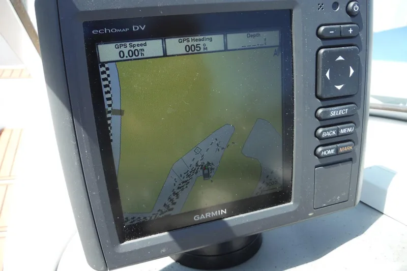 Slide: The Image of Garmin GPS display on 2011 Yamaha Boats 242 Limited, showing navigation details. - 13