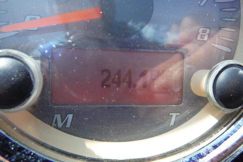Slide: The Image of Close-up of a 2011 Yamaha Boats 242 Limited engine hour meter displaying 244.1 hours. - 15