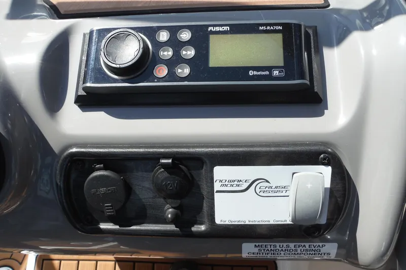 Slide: The Image of Control panel of 2011 Yamaha Boats 242 Limited with Fusion audio system and cruise assist. - 16